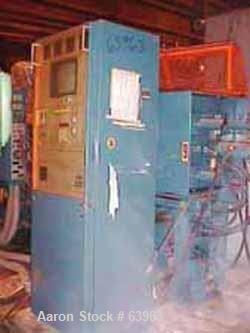 USED: Demag 60 ton injection molding machine, model D60-151. Distance between tie bars 12-1/2", platen size 19-1/2" x 21-1/2", fully open 19", 3/60/460 volt, NCII control panel with video display.