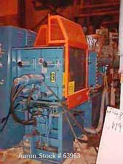 USED: Demag 60 ton injection molding machine, model D60-151. Distance between tie bars 12-1/2", platen size 19-1/2" x 21-1/2", fully open 19", 3/60/460 volt, NCII control panel with video display.