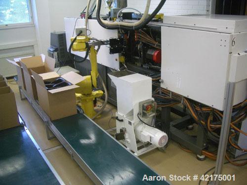 Used Fanuc Roboshot 100 Ton Injection Molding Machine, type Alpha-100C with 28 mm screw. Includes transformer for 380V input power, core pull control, (2) Regloplas mold heaters, 32 mm screw and ther...