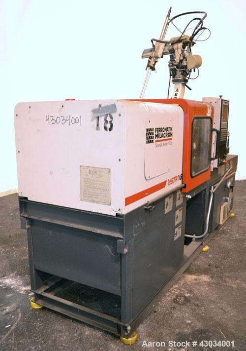 Used Ferromatik Milacron Vista V Series Toggle Injection Molder, 85 Ton, Model VV-85-4.44. Clamp stroke 11", maximum daylight 24". Mold height maximum/minimum 13"/4.9". Platen size 22" x 19.7". Tie r...