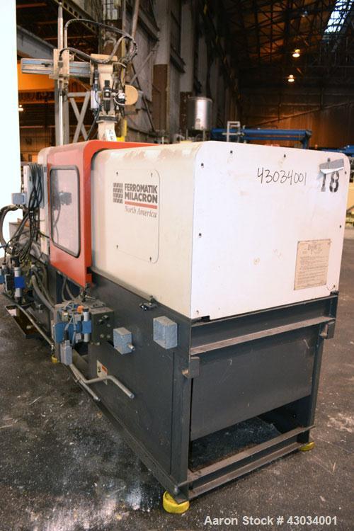 Used Ferromatik Milacron Vista V Series Toggle Injection Molder, 85 Ton, Model VV-85-4.44. Clamp stroke 11", maximum daylight 24". Mold height maximum/minimum 13"/4.9". Platen size 22" x 19.7". Tie r...