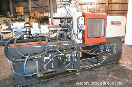 Used Ferromatik Milacron Vista V Series Toggle Injection Molder, 85 Ton, Model VV-85-4.44. Clamp stroke 11", maximum daylight 24". Mold height maximum/minimum 13"/4.9". Platen size 22" x 19.7". Tie r...
