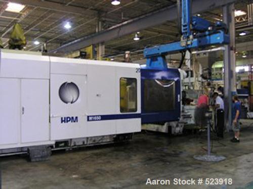 USED: 1650 ton, 250 oz, HPM injection molding machine, model MLH 1650-250. Wide platen. Installed new 1997. Platen size 98" x 79".Distance between tie bars (H x V) 76" x 62". Injection stroke 22.25"....