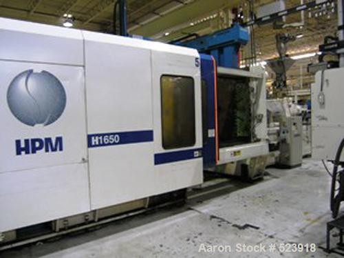 USED: 1650 ton, 250 oz, HPM injection molding machine, model MLH 1650-250. Wide platen. Installed new 1997. Platen size 98" x 79".Distance between tie bars (H x V) 76" x 62". Injection stroke 22.25"....