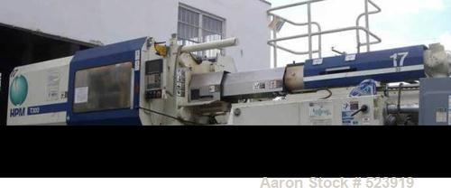 USED: 300 ton, 32 oz, HPM injection molding machine, model T300-32. New 1997. 41,505 hours. Platen size 36.5" x 36.8". Distance between tie bars 24.5" x 24.5". Clamp stroke 22.0". Maximum daylight 44...