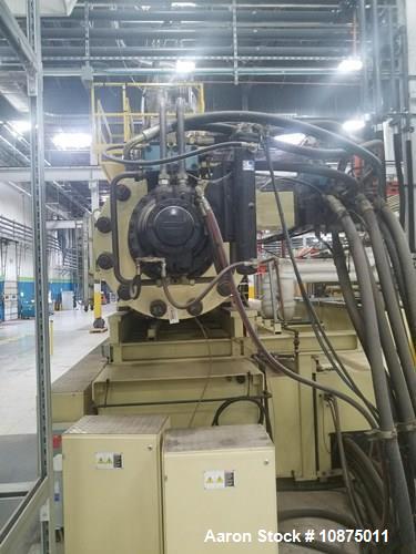 Used Husky Injection Molding Machine, Model Mdl#: QD2350 MMC RS235/235, MFG 2003. 2500 ton capacity, 1613 oz shot capacity. 120.00" x 120.00" platen size, 78.74" x 62.99" distance between bars. Mold ...
