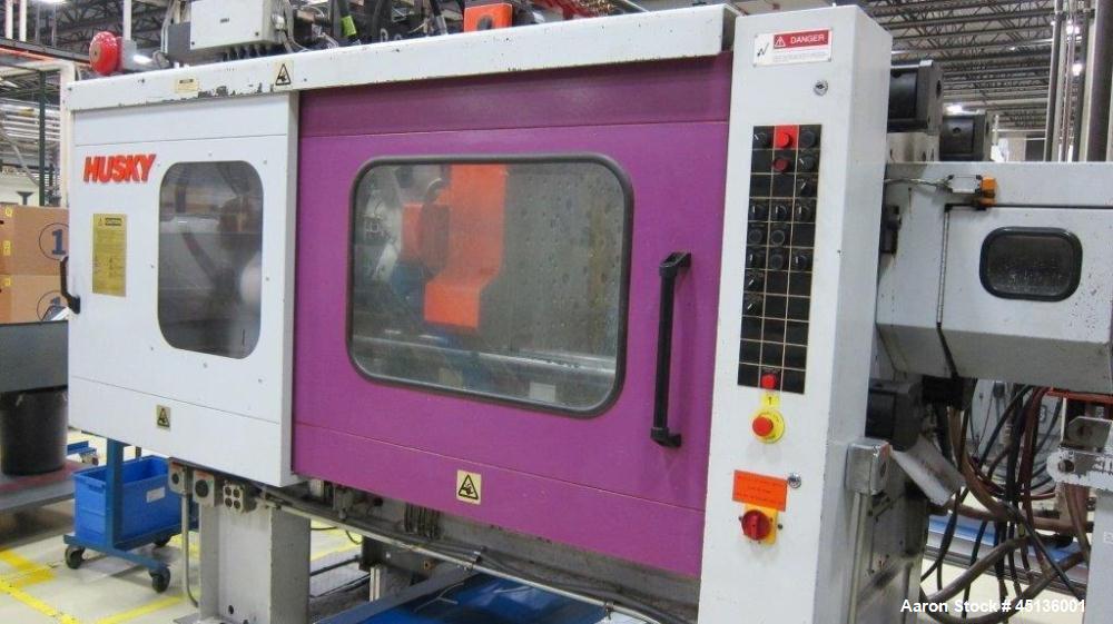 Used Husky 225 Ton Horizontal Injection Mold Machine, Model SX225 R/S 50/50, Serial #11188, Year 1994. Distance Between Tie Bars: 620mm x 620mm. Clamp Stroke  Maximum: 475mm. Mold Shut height: 200 to...