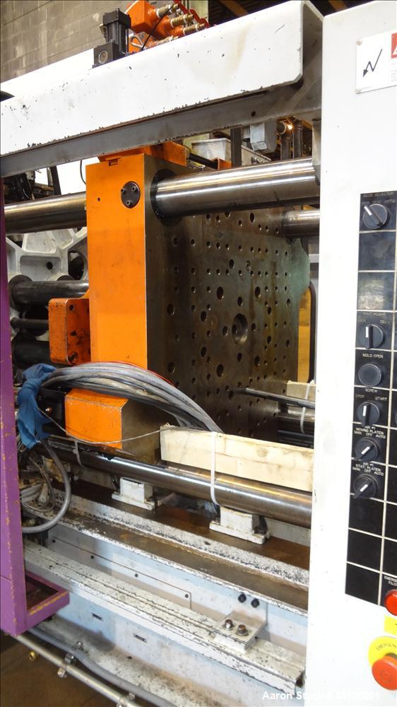 Used Husky 225 Ton Horizontal Injection Mold Machine, Model SX225 R/S 50/50, Serial #11188, Year 1994. Distance Between Tie Bars: 620mm x 620mm. Clamp Stroke  Maximum: 475mm. Mold Shut height: 200 to...