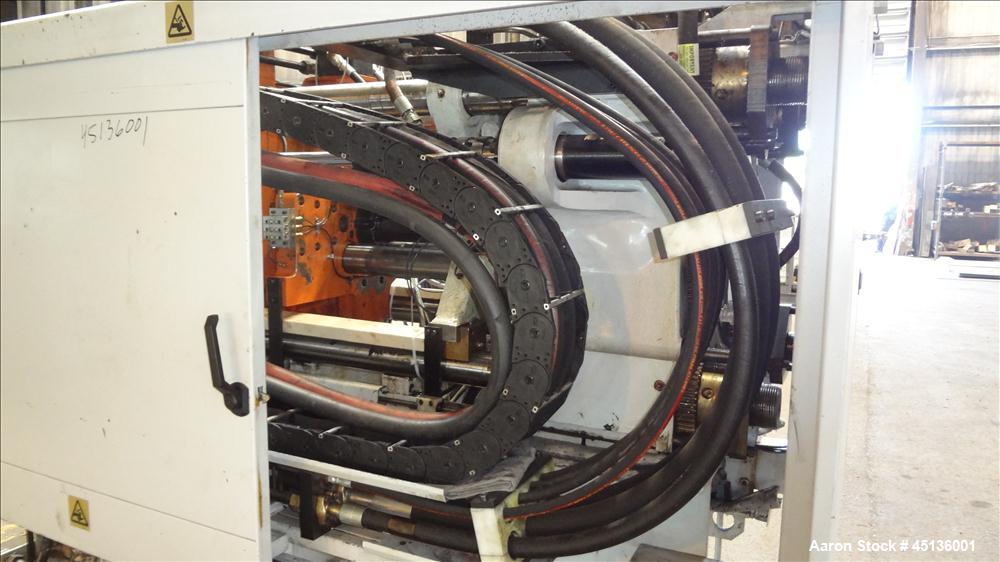 Used Husky 225 Ton Horizontal Injection Mold Machine, Model SX225 R/S 50/50, Serial #11188, Year 1994. Distance Between Tie Bars: 620mm x 620mm. Clamp Stroke  Maximum: 475mm. Mold Shut height: 200 to...