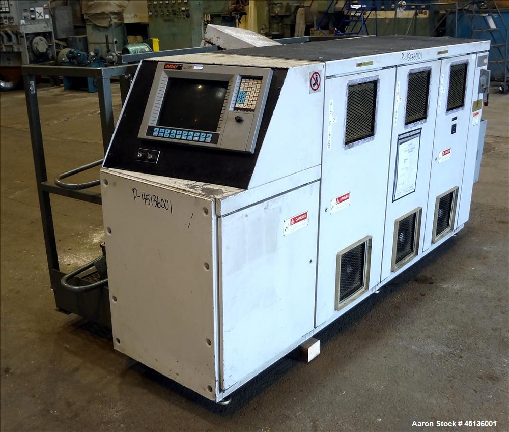Used Husky 225 Ton Horizontal Injection Mold Machine, Model SX225 R/S 50/50, Serial #11188, Year 1994. Distance Between Tie Bars: 620mm x 620mm. Clamp Stroke  Maximum: 475mm. Mold Shut height: 200 to...