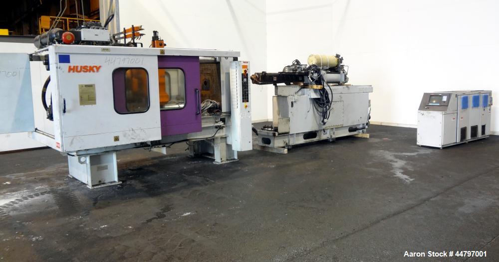 Used Husky Horizontal Injection Mold Machine, 300 Tons, Model SX300 RS60/50. Platen Size: 40.79" x 40.79". Distance Between 4.5" Tie Bars: 28.35" x 28.35". Clamp Stroke: 25.59". Shut Height Minimum/M...