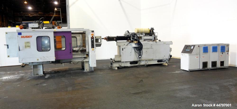 Used Husky Horizontal Injection Mold Machine, 300 Tons, Model SX300 RS60/50. Platen Size: 40.79" x 40.79". Distance Between 4.5" Tie Bars: 28.35" x 28.35". Clamp Stroke: 25.59". Shut Height Minimum/M...