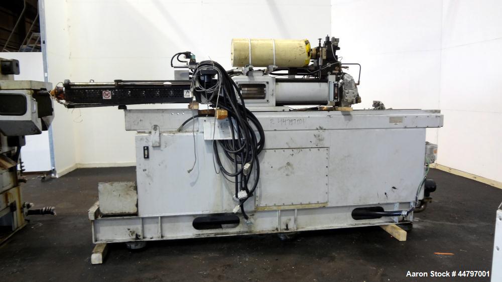 Used Husky Horizontal Injection Mold Machine, 300 Tons, Model SX300 RS60/50. Platen Size: 40.79" x 40.79". Distance Between 4.5" Tie Bars: 28.35" x 28.35". Clamp Stroke: 25.59". Shut Height Minimum/M...