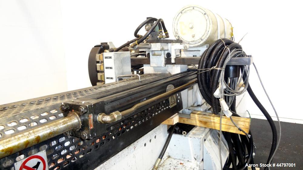 Used Husky Horizontal Injection Mold Machine, 300 Tons, Model SX300 RS60/50. Platen Size: 40.79" x 40.79". Distance Between 4.5" Tie Bars: 28.35" x 28.35". Clamp Stroke: 25.59". Shut Height Minimum/M...
