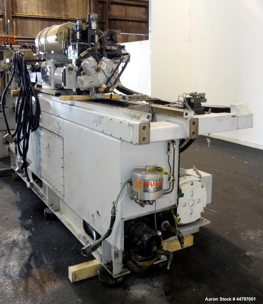Used Husky Horizontal Injection Mold Machine, 300 Tons, Model SX300 RS60/50. Platen Size: 40.79" x 40.79". Distance Between 4.5" Tie Bars: 28.35" x 28.35". Clamp Stroke: 25.59". Shut Height Minimum/M...
