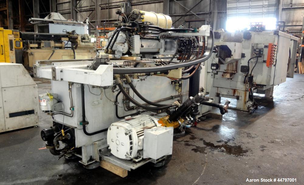 Used Husky Horizontal Injection Mold Machine, 300 Tons, Model SX300 RS60/50. Platen Size: 40.79" x 40.79". Distance Between 4.5" Tie Bars: 28.35" x 28.35". Clamp Stroke: 25.59". Shut Height Minimum/M...