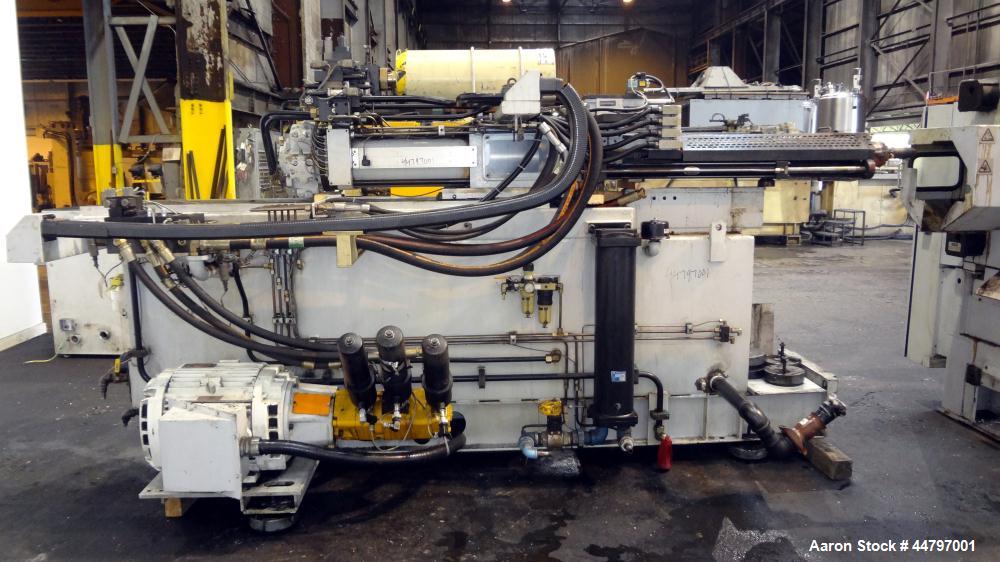 Used Husky Horizontal Injection Mold Machine, 300 Tons, Model SX300 RS60/50. Platen Size: 40.79" x 40.79". Distance Between 4.5" Tie Bars: 28.35" x 28.35". Clamp Stroke: 25.59". Shut Height Minimum/M...