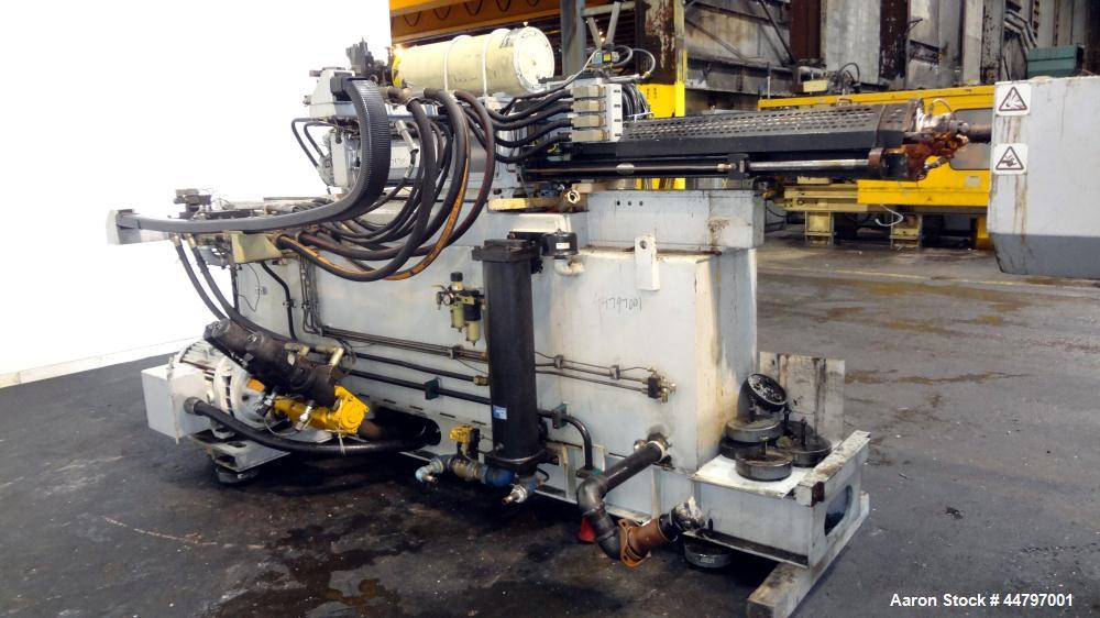 Used Husky Horizontal Injection Mold Machine, 300 Tons, Model SX300 RS60/50. Platen Size: 40.79" x 40.79". Distance Between 4.5" Tie Bars: 28.35" x 28.35". Clamp Stroke: 25.59". Shut Height Minimum/M...