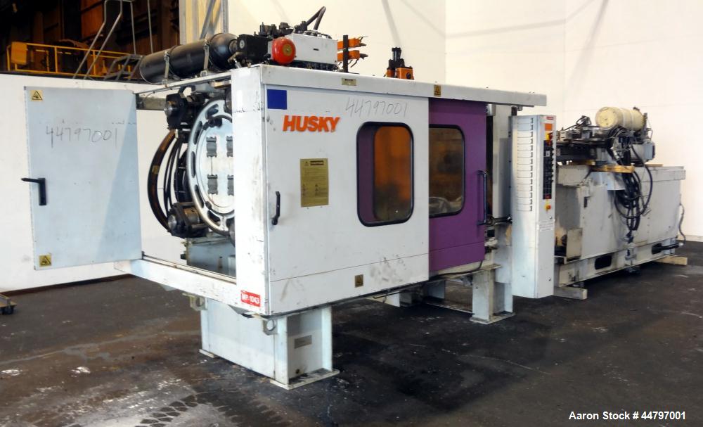 Used Husky Horizontal Injection Mold Machine, 300 Tons, Model SX300 RS60/50. Platen Size: 40.79" x 40.79". Distance Between 4.5" Tie Bars: 28.35" x 28.35". Clamp Stroke: 25.59". Shut Height Minimum/M...