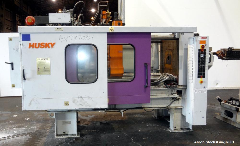 Used Husky Horizontal Injection Mold Machine, 300 Tons, Model SX300 RS60/50. Platen Size: 40.79" x 40.79". Distance Between 4.5" Tie Bars: 28.35" x 28.35". Clamp Stroke: 25.59". Shut Height Minimum/M...