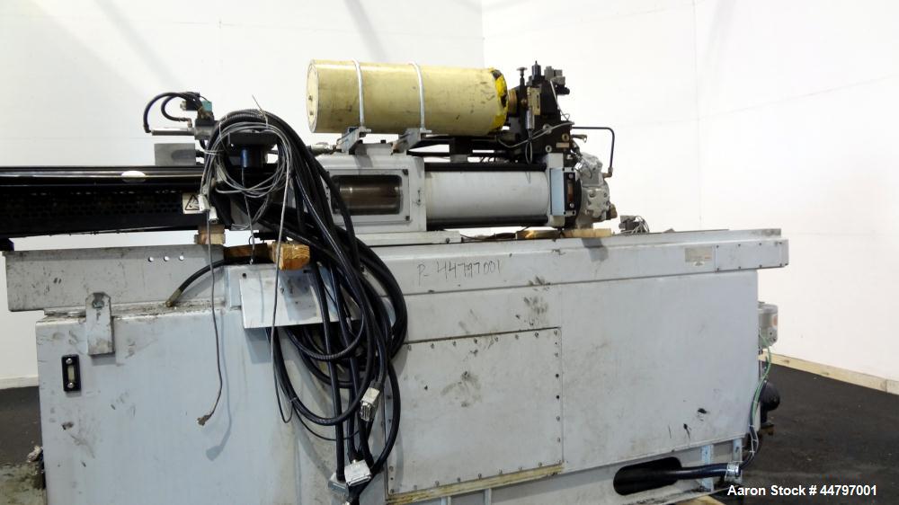 Used Husky Horizontal Injection Mold Machine, 300 Tons, Model SX300 RS60/50. Platen Size: 40.79" x 40.79". Distance Between 4.5" Tie Bars: 28.35" x 28.35". Clamp Stroke: 25.59". Shut Height Minimum/M...
