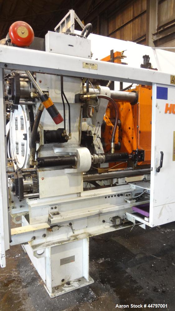 Used Husky Horizontal Injection Mold Machine, 300 Tons, Model SX300 RS60/50. Platen Size: 40.79" x 40.79". Distance Between 4.5" Tie Bars: 28.35" x 28.35". Clamp Stroke: 25.59". Shut Height Minimum/M...