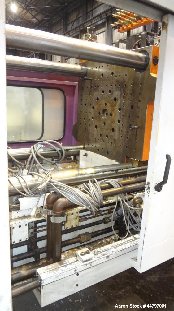 Used Husky Horizontal Injection Mold Machine, 300 Tons, Model SX300 RS60/50. Platen Size: 40.79" x 40.79". Distance Between 4.5" Tie Bars: 28.35" x 28.35". Clamp Stroke: 25.59". Shut Height Minimum/M...