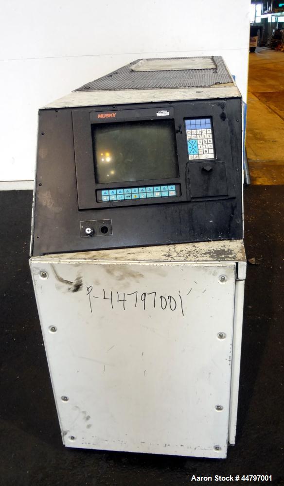 Used Husky Horizontal Injection Mold Machine, 300 Tons, Model SX300 RS60/50. Platen Size: 40.79" x 40.79". Distance Between 4.5" Tie Bars: 28.35" x 28.35". Clamp Stroke: 25.59". Shut Height Minimum/M...