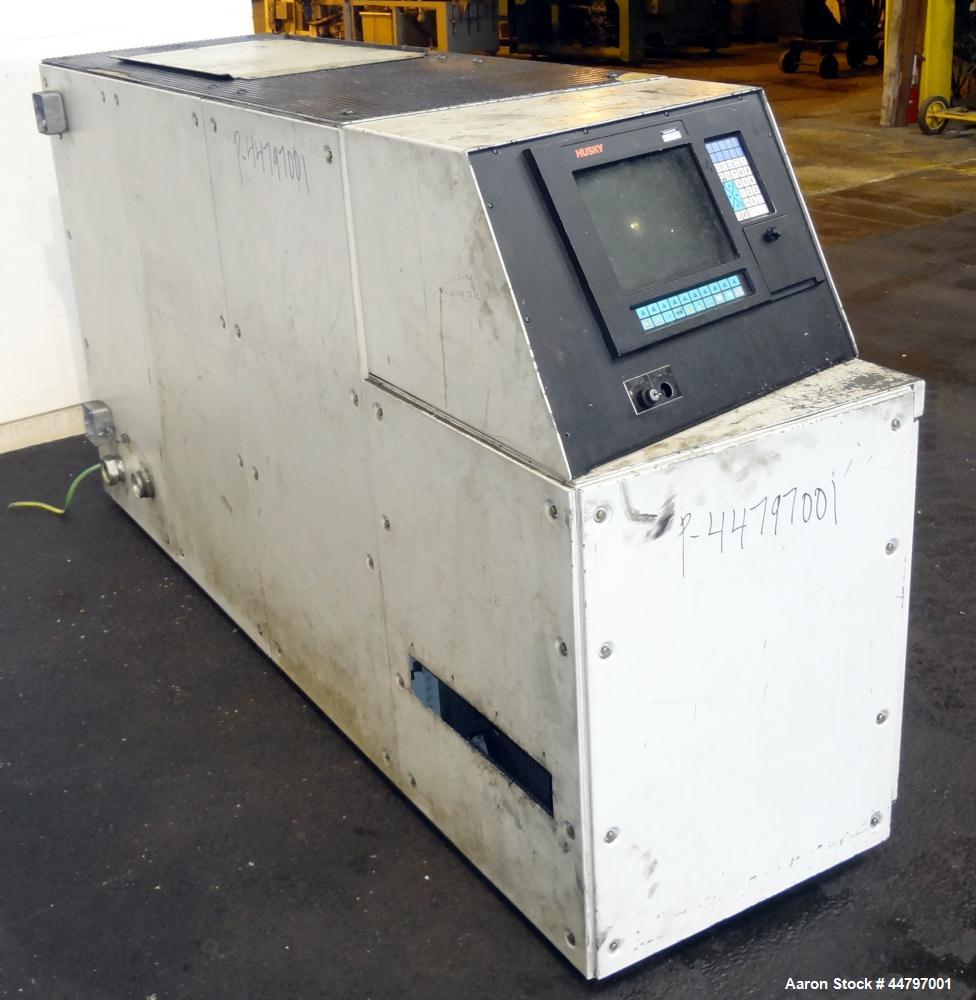 Used Husky Horizontal Injection Mold Machine, 300 Tons, Model SX300 RS60/50. Platen Size: 40.79" x 40.79". Distance Between 4.5" Tie Bars: 28.35" x 28.35". Clamp Stroke: 25.59". Shut Height Minimum/M...