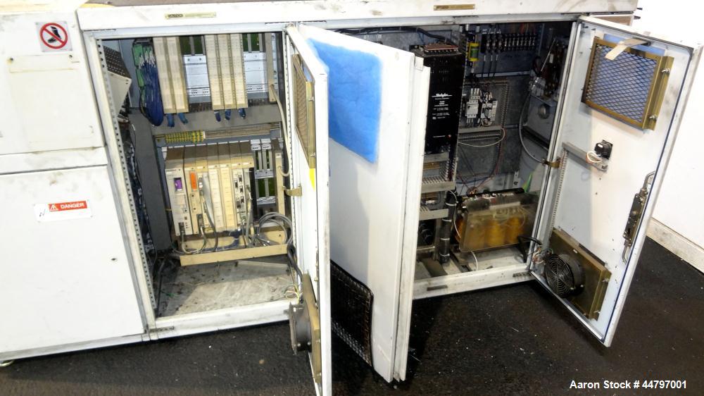 Used Husky Horizontal Injection Mold Machine, 300 Tons, Model SX300 RS60/50. Platen Size: 40.79" x 40.79". Distance Between 4.5" Tie Bars: 28.35" x 28.35". Clamp Stroke: 25.59". Shut Height Minimum/M...