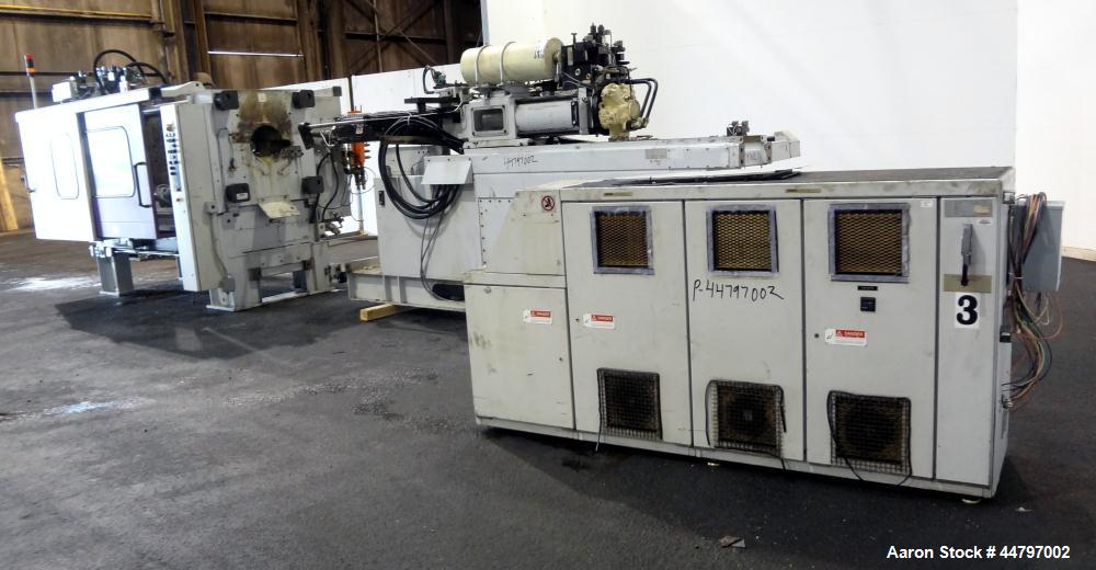 Used Husky Horizontal Injection Mold Machine, 300 Tons, Model SX300 RS60/50. Platen Size: 40.79" x 40.79". Distance Between 4.5" Tie Bars: 28.35" x 28.35". Clamp Stroke: 25.59". Shut Height Minimum/M...