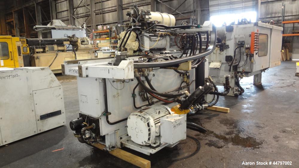 Used Husky Horizontal Injection Mold Machine, 300 Tons, Model SX300 RS60/50. Platen Size: 40.79" x 40.79". Distance Between 4.5" Tie Bars: 28.35" x 28.35". Clamp Stroke: 25.59". Shut Height Minimum/M...