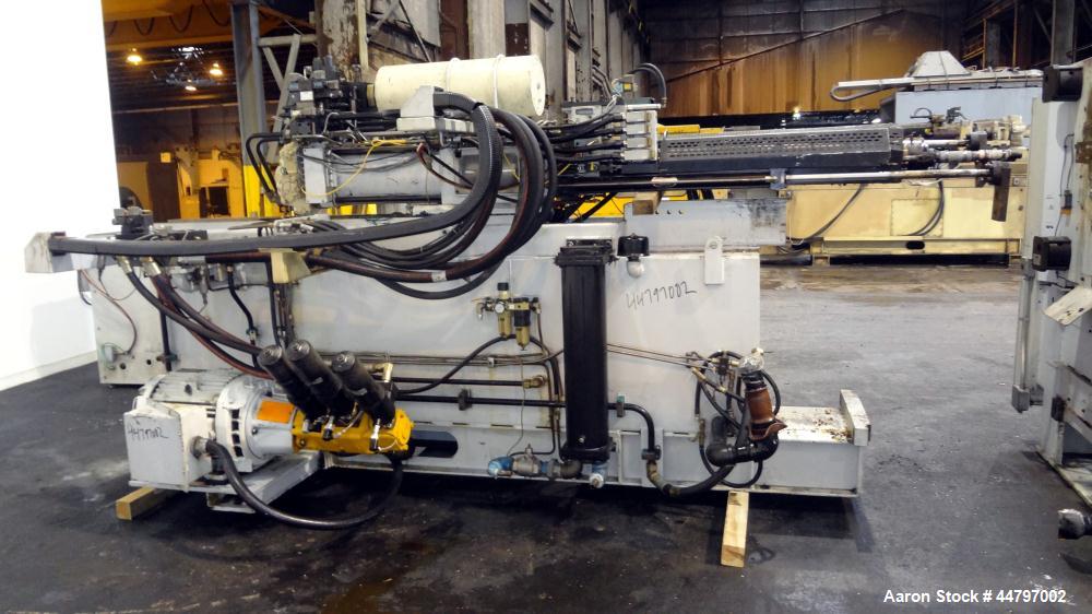 Used Husky Horizontal Injection Mold Machine, 300 Tons, Model SX300 RS60/50. Platen Size: 40.79" x 40.79". Distance Between 4.5" Tie Bars: 28.35" x 28.35". Clamp Stroke: 25.59". Shut Height Minimum/M...