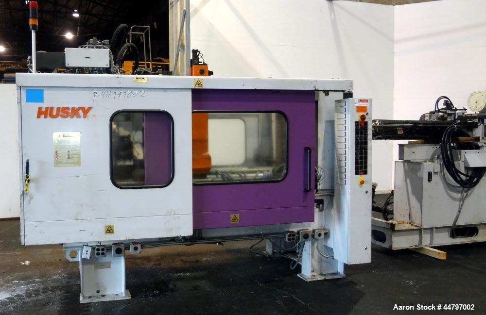 Used Husky Horizontal Injection Mold Machine, 300 Tons, Model SX300 RS60/50. Platen Size: 40.79" x 40.79". Distance Between 4.5" Tie Bars: 28.35" x 28.35". Clamp Stroke: 25.59". Shut Height Minimum/M...
