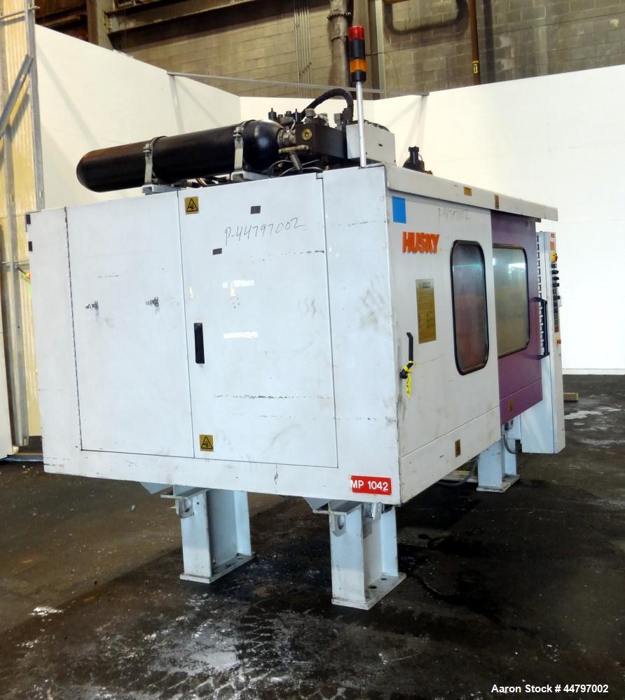 Used Husky Horizontal Injection Mold Machine, 300 Tons, Model SX300 RS60/50. Platen Size: 40.79" x 40.79". Distance Between 4.5" Tie Bars: 28.35" x 28.35". Clamp Stroke: 25.59". Shut Height Minimum/M...