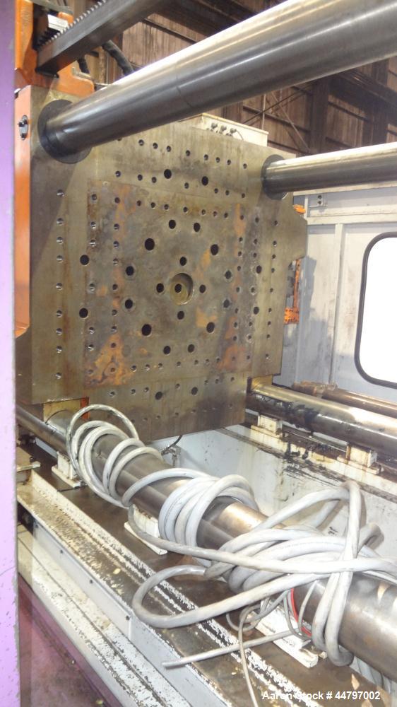 Used Husky Horizontal Injection Mold Machine, 300 Tons, Model SX300 RS60/50. Platen Size: 40.79" x 40.79". Distance Between 4.5" Tie Bars: 28.35" x 28.35". Clamp Stroke: 25.59". Shut Height Minimum/M...