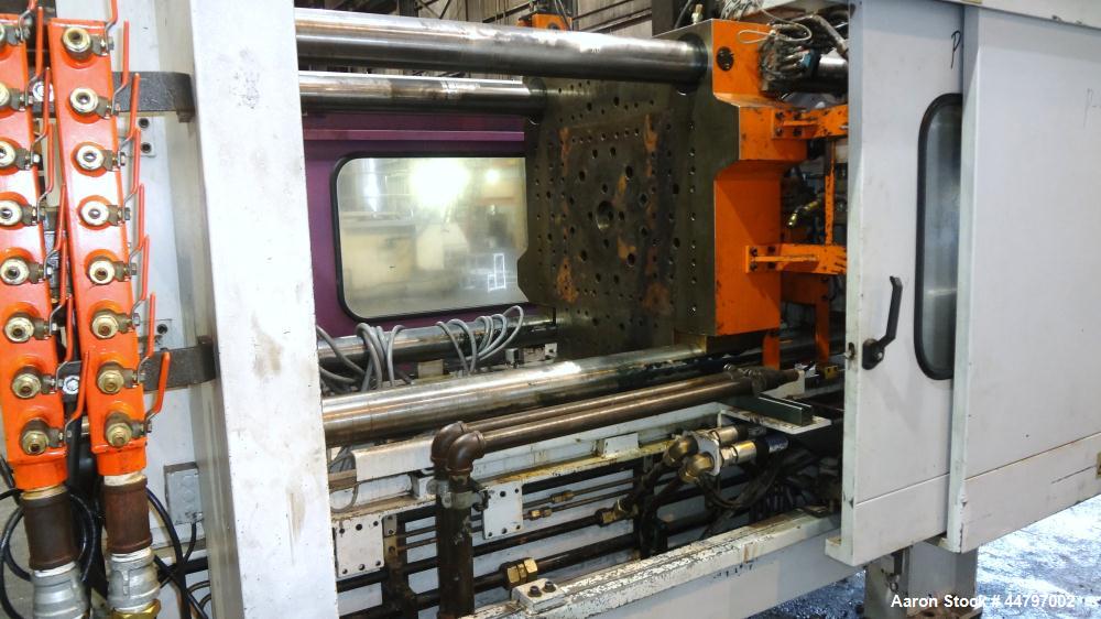 Used Husky Horizontal Injection Mold Machine, 300 Tons, Model SX300 RS60/50. Platen Size: 40.79" x 40.79". Distance Between 4.5" Tie Bars: 28.35" x 28.35". Clamp Stroke: 25.59". Shut Height Minimum/M...