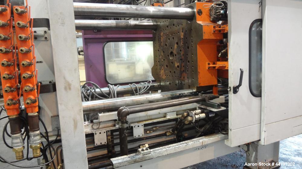 Used Husky Horizontal Injection Mold Machine, 300 Tons, Model SX300 RS60/50. Platen Size: 40.79" x 40.79". Distance Between 4.5" Tie Bars: 28.35" x 28.35". Clamp Stroke: 25.59". Shut Height Minimum/M...