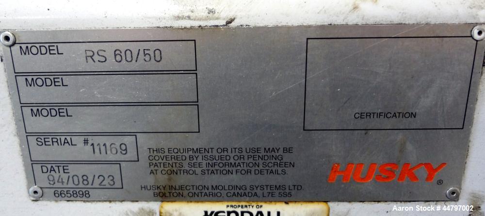 Used Husky Horizontal Injection Mold Machine, 300 Tons, Model SX300 RS60/50. Platen Size: 40.79" x 40.79". Distance Between 4.5" Tie Bars: 28.35" x 28.35". Clamp Stroke: 25.59". Shut Height Minimum/M...