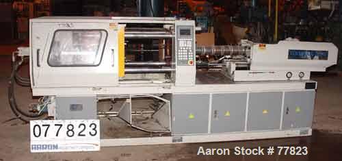 USED:Itairy Machinery toggle injection molding machine, modelUM-120 I III. 120 ton clamping pressure. Platen size approx 23-1/2" x23-1/2". Distance between 2-3/4" diameter tie bars approx 15-1/2" lef...