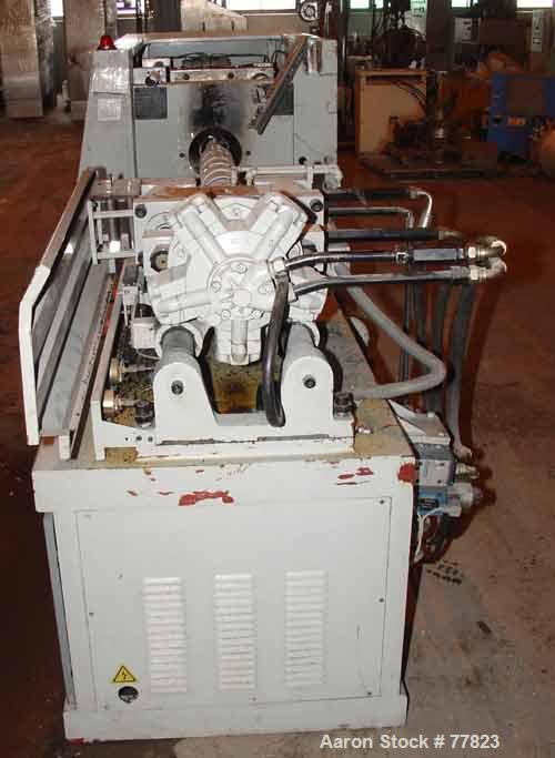 USED:Itairy Machinery toggle injection molding machine, modelUM-120 I III. 120 ton clamping pressure. Platen size approx 23-1/2" x23-1/2". Distance between 2-3/4" diameter tie bars approx 15-1/2" lef...