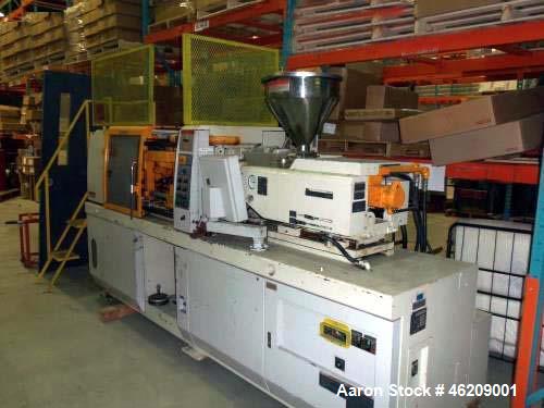 Used Kawaguchi Injection Molding Machine, Model KM50B2. 50 Ton clamping force. Space between tie bars 310 mm x 310mm. Platen size 450 mm x 445mm, 150 mm minimum mold height, 300 mm maximum mold heigh...