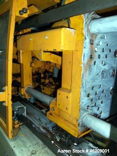 Used Kawaguchi Injection Molding Machine, Model KM50B2. 50 Ton clamping force. Space between tie bars 310 mm x 310mm. Platen size 450 mm x 445mm, 150 mm minimum mold height, 300 mm maximum mold heigh...