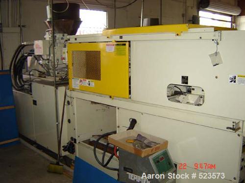 USED: Mitsubishi model 90MJ2-5, 90 ton injection molding machine. Mfg 2000. 4.9 oz shot. Tie bar spacing is 14.96" x 14.96". Platen 22.05" x 22.05". Hydraulic clamp. Having a 17.7" stroke, 24.8" dayl...