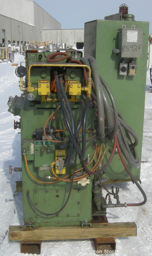 Used Newbury Industries Toggle Injection Molding Machine, Model HI30RS, 30 Ton. Platen size approximately 12-1/2" x 11". Distance between 1-1/2" diameter tie bars approximately 8-3/4" left to right x...