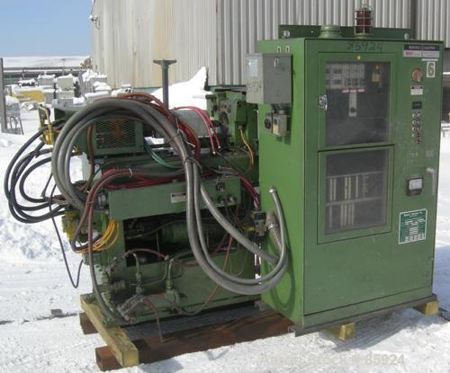 Used Newbury Industries Toggle Injection Molding Machine, Model HI30RS, 30 Ton. Platen size approximately 12-1/2" x 11". Distance between 1-1/2" diameter tie bars approximately 8-3/4" left to right x...
