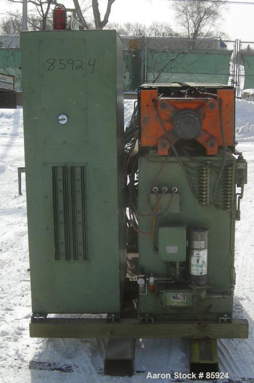 Used Newbury Industries Toggle Injection Molding Machine, Model HI30RS, 30 Ton. Platen size approximately 12-1/2" x 11". Distance between 1-1/2" diameter tie bars approximately 8-3/4" left to right x...