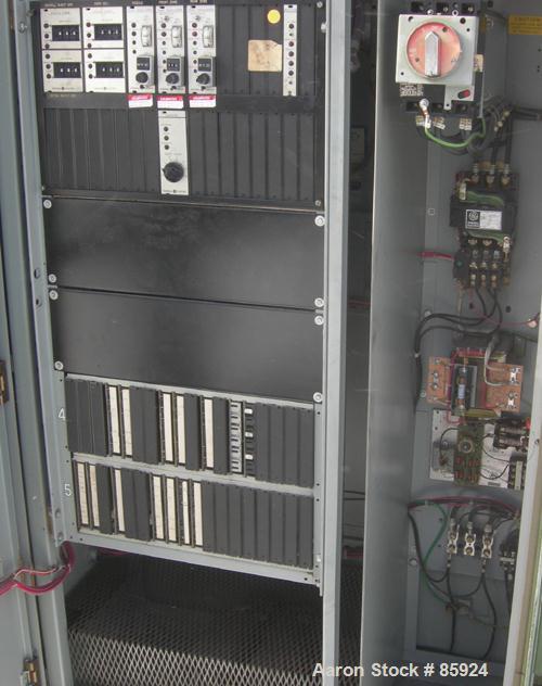 Used Newbury Industries Toggle Injection Molding Machine, Model HI30RS, 30 Ton. Platen size approximately 12-1/2" x 11". Distance between 1-1/2" diameter tie bars approximately 8-3/4" left to right x...