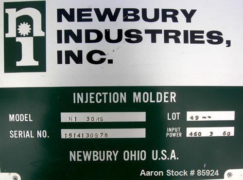 Used Newbury Industries Toggle Injection Molding Machine, Model HI30RS, 30 Ton. Platen size approximately 12-1/2" x 11". Distance between 1-1/2" diameter tie bars approximately 8-3/4" left to right x...