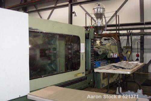 USED: Nissei injection molding machine, model PS860S420BSE. 860 metrictons (948 US), 180 oz, NC8000 controls, robot interface, currentlyunder power. Mfg 1986.